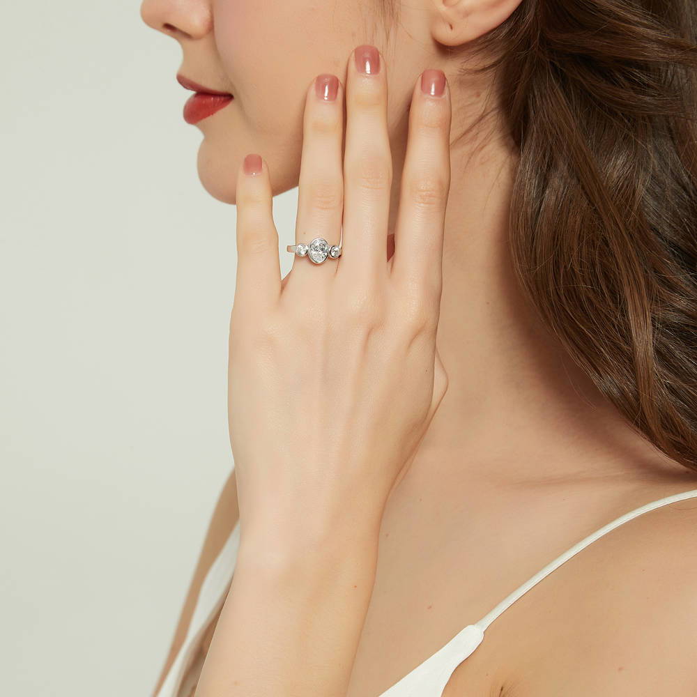 Model wearing 3-Stone Oval CZ Ring in Sterling Silver