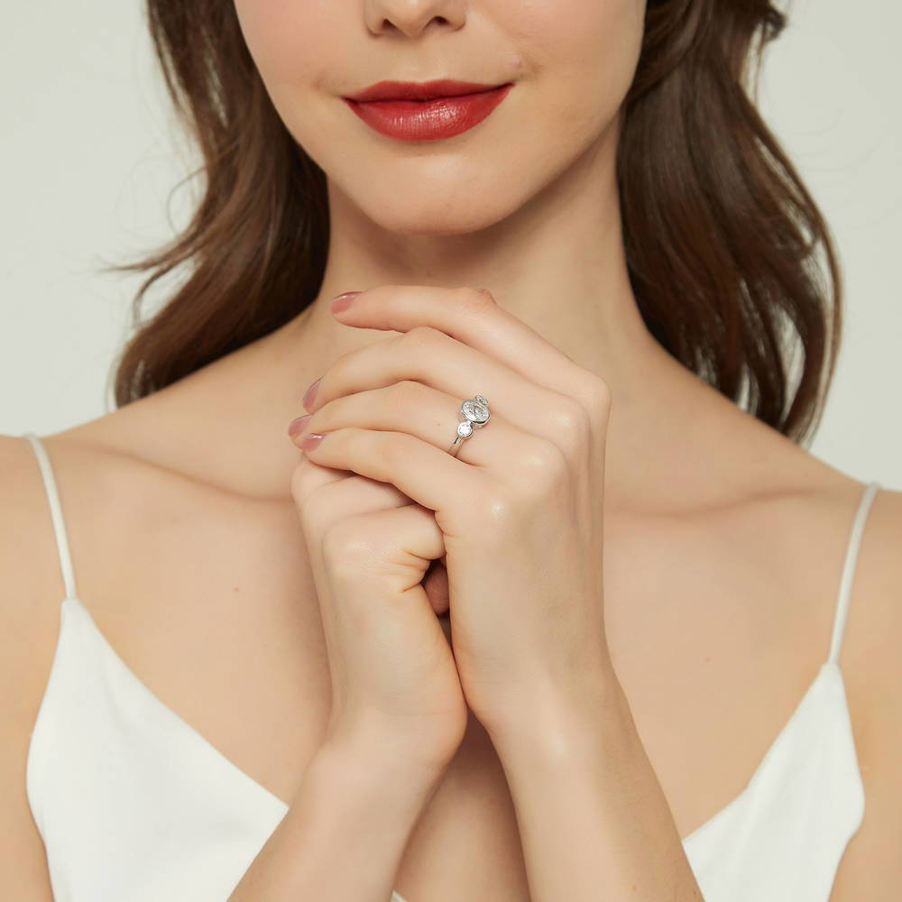 Model wearing 3-Stone Oval CZ Ring in Sterling Silver