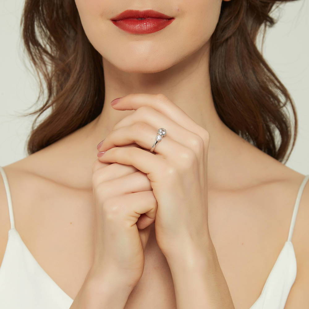 Model wearing 3-Stone Round CZ Ring in Sterling Silver