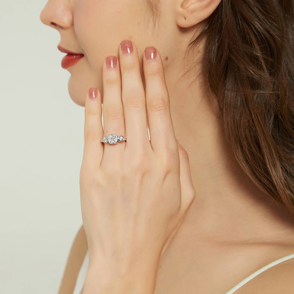 Model wearing 3-Stone Cushion CZ Ring in Sterling Silver, 3 of 9