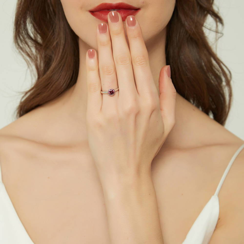 Model wearing Solitaire 0.8ct Red Bezel Set Round CZ Ring Set in Sterling Silver, 2 of 10