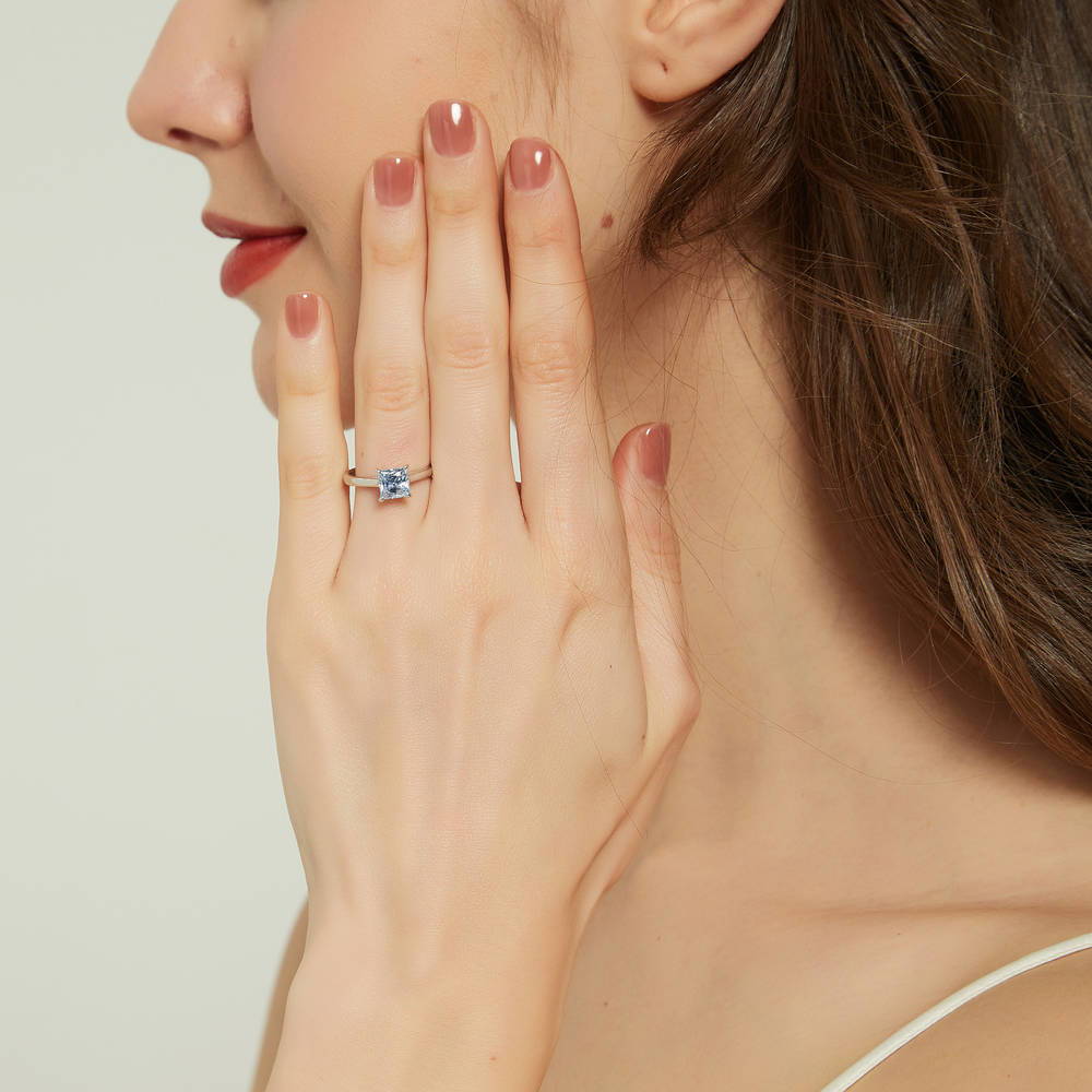 Model wearing Solitaire Greyish Blue Princess CZ Ring in Sterling Silver 1.2ct, 3 of 9