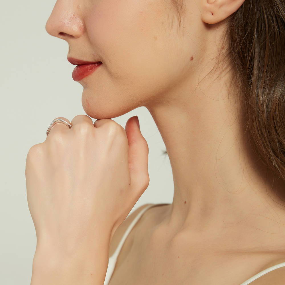 Model wearing Wishbone CZ Curved Half Eternity Ring in Sterling Silver, 8 of 9