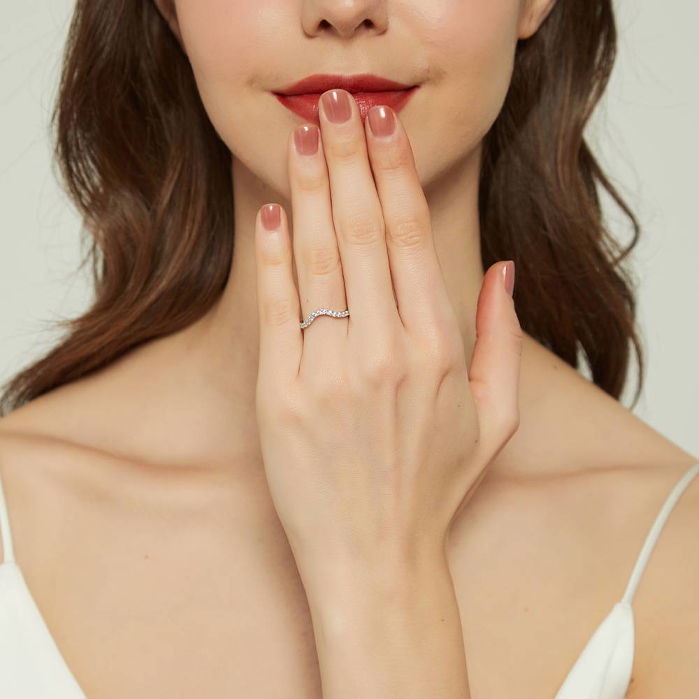 Model wearing Wishbone CZ Curved Half Eternity Ring in Sterling Silver, 2 of 9