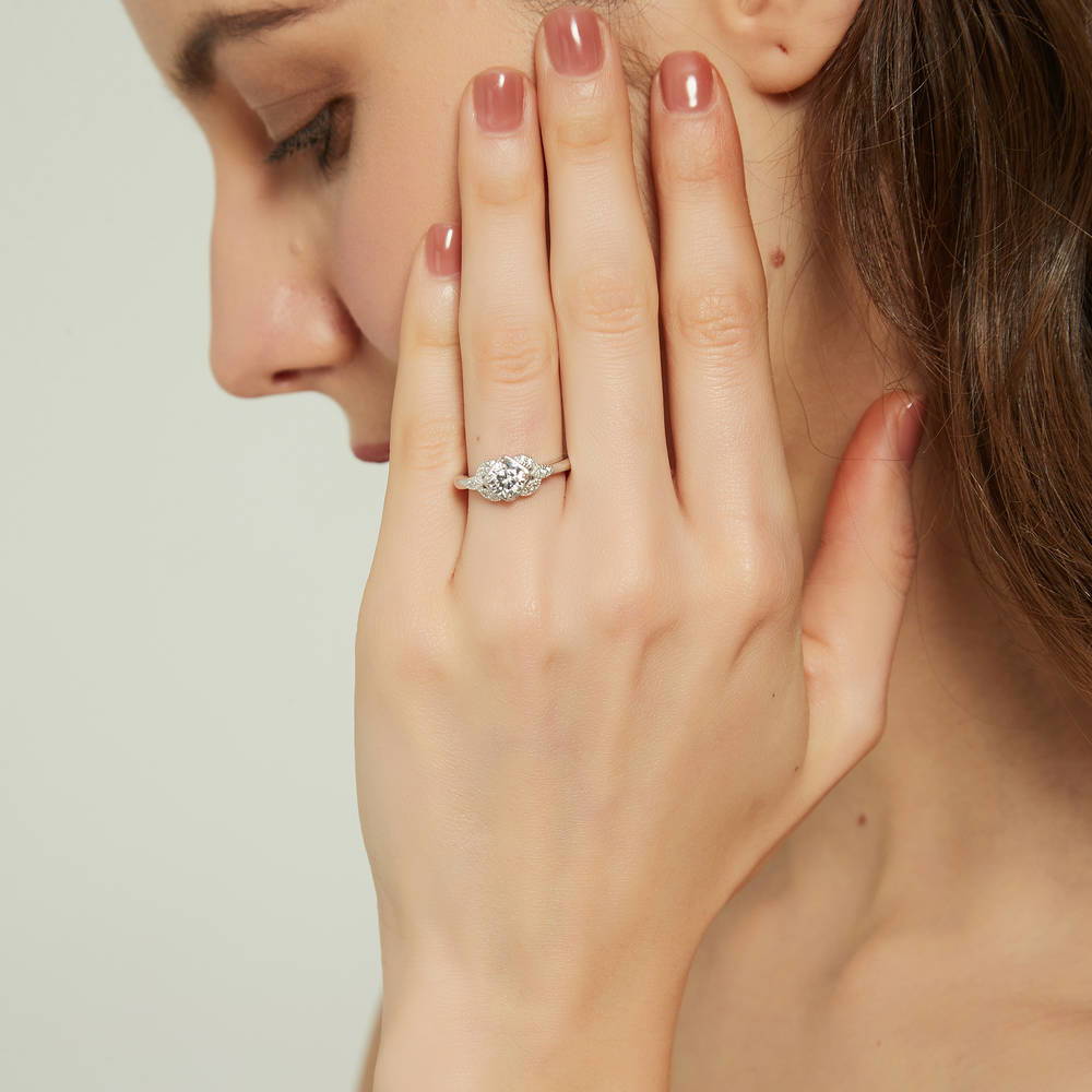 Model wearing Flower Solitaire CZ Ring in Sterling Silver, 3 of 10