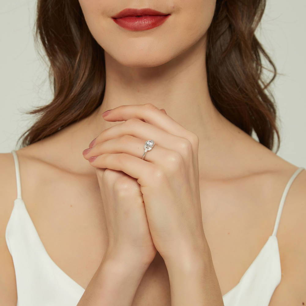 Model wearing Flower Solitaire CZ Ring in Sterling Silver, 7 of 10