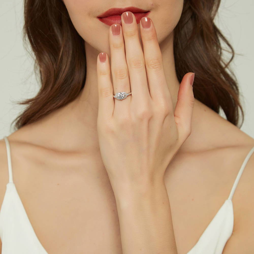 Model wearing Flower Solitaire CZ Ring in Sterling Silver, 2 of 10