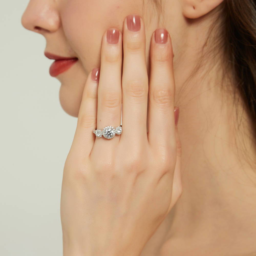 Model wearing 3-Stone Round CZ Ring in Sterling Silver