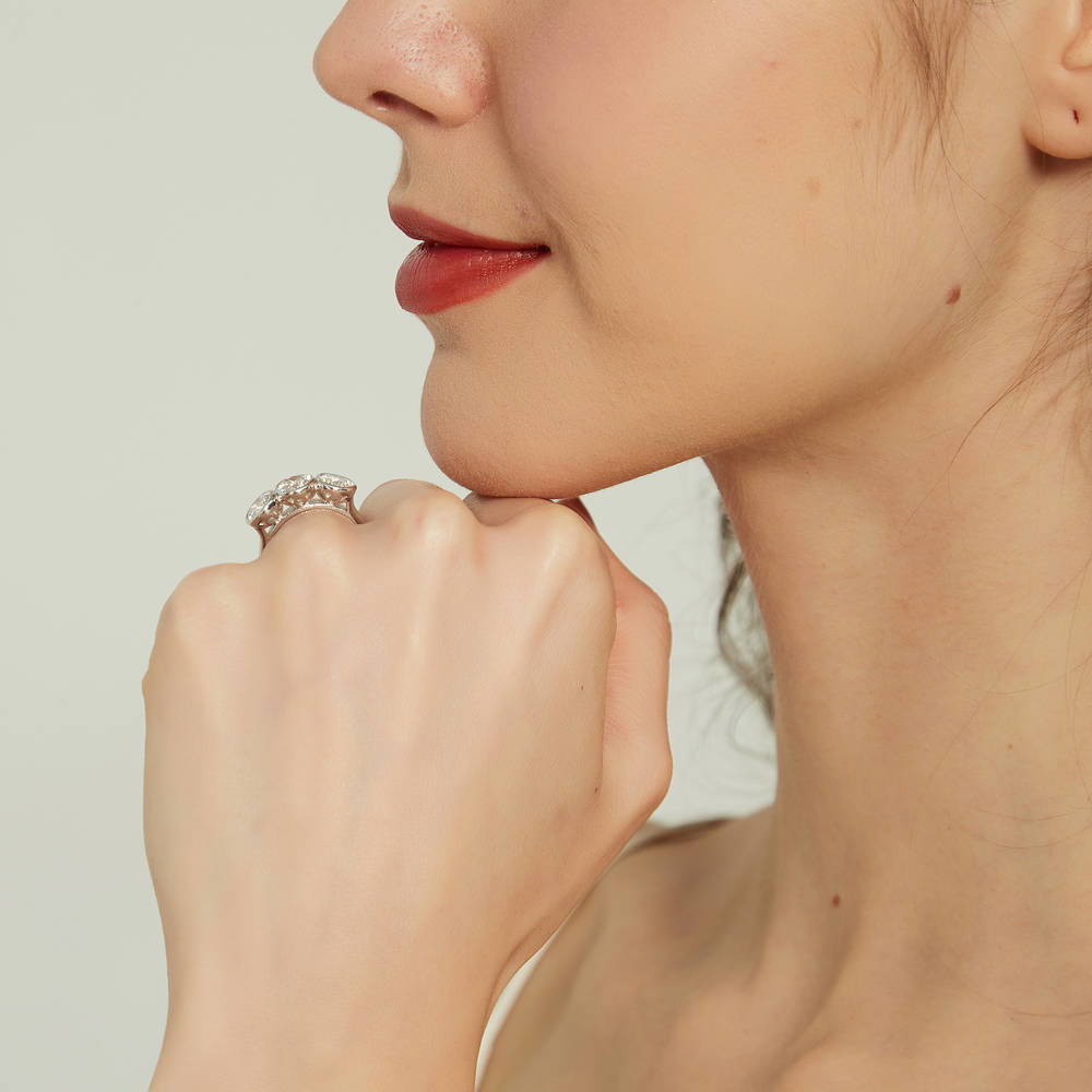 Model wearing 3-Stone Round CZ Ring in Sterling Silver