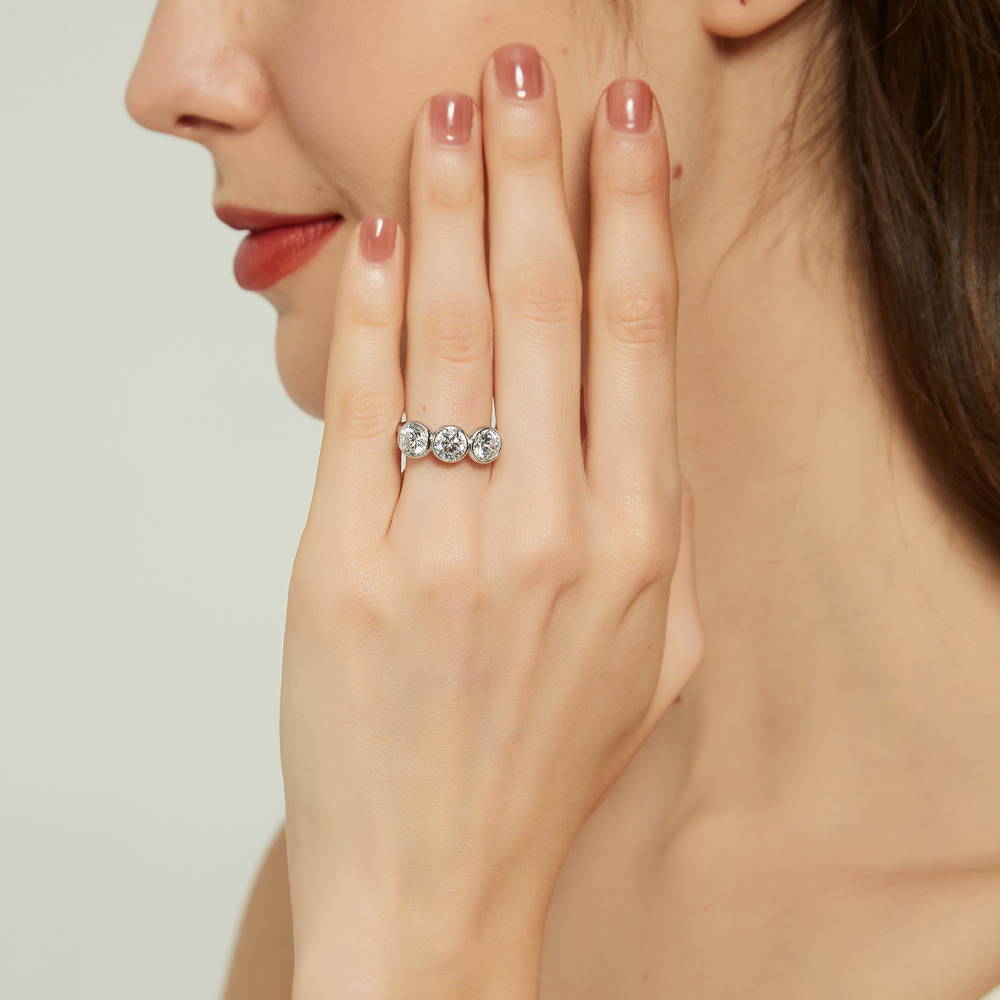 Model wearing 3-Stone Round CZ Ring in Sterling Silver