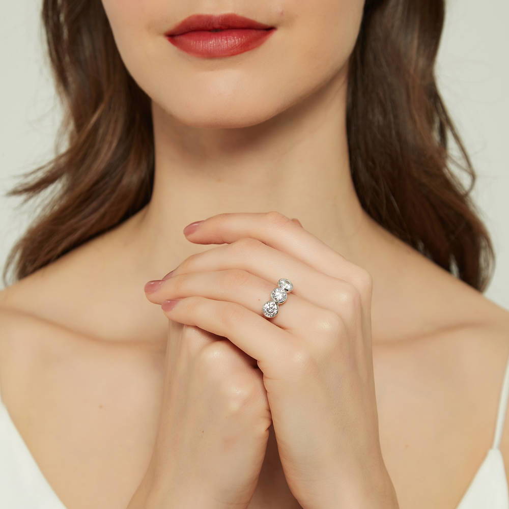 Model wearing 3-Stone Round CZ Ring in Sterling Silver