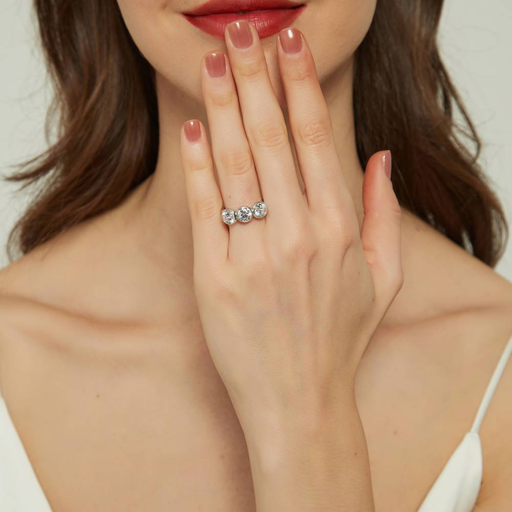 Model wearing 3-Stone Round CZ Ring in Sterling Silver