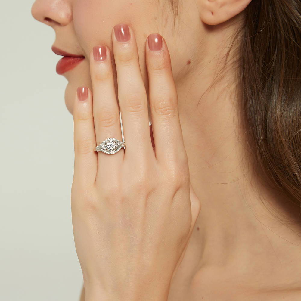 Model wearing 3-Stone Round CZ Ring in Sterling Silver