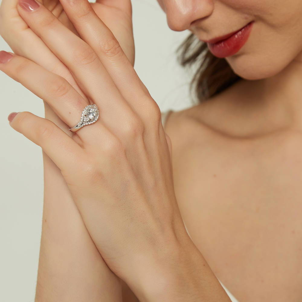 Model wearing 3-Stone Round CZ Ring in Sterling Silver