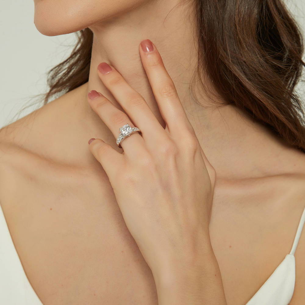 Model wearing Solitaire 3ct Cushion CZ Ring in Sterling Silver, 2 of 9