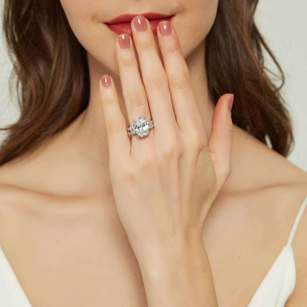 Model wearing 3-Stone Oval CZ Ring Set in Sterling Silver