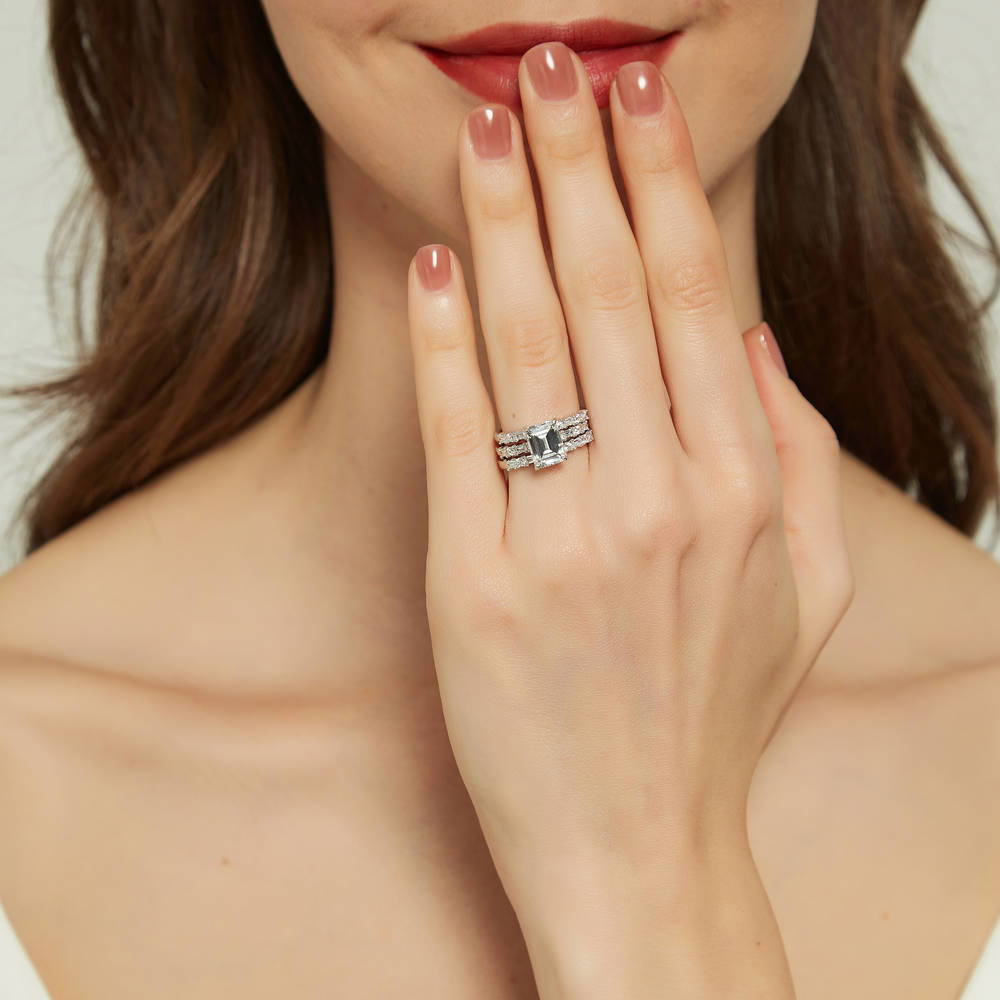 Model wearing Solitaire Art Deco 2.1ct Emerald Cut CZ Ring Set in Sterling Silver