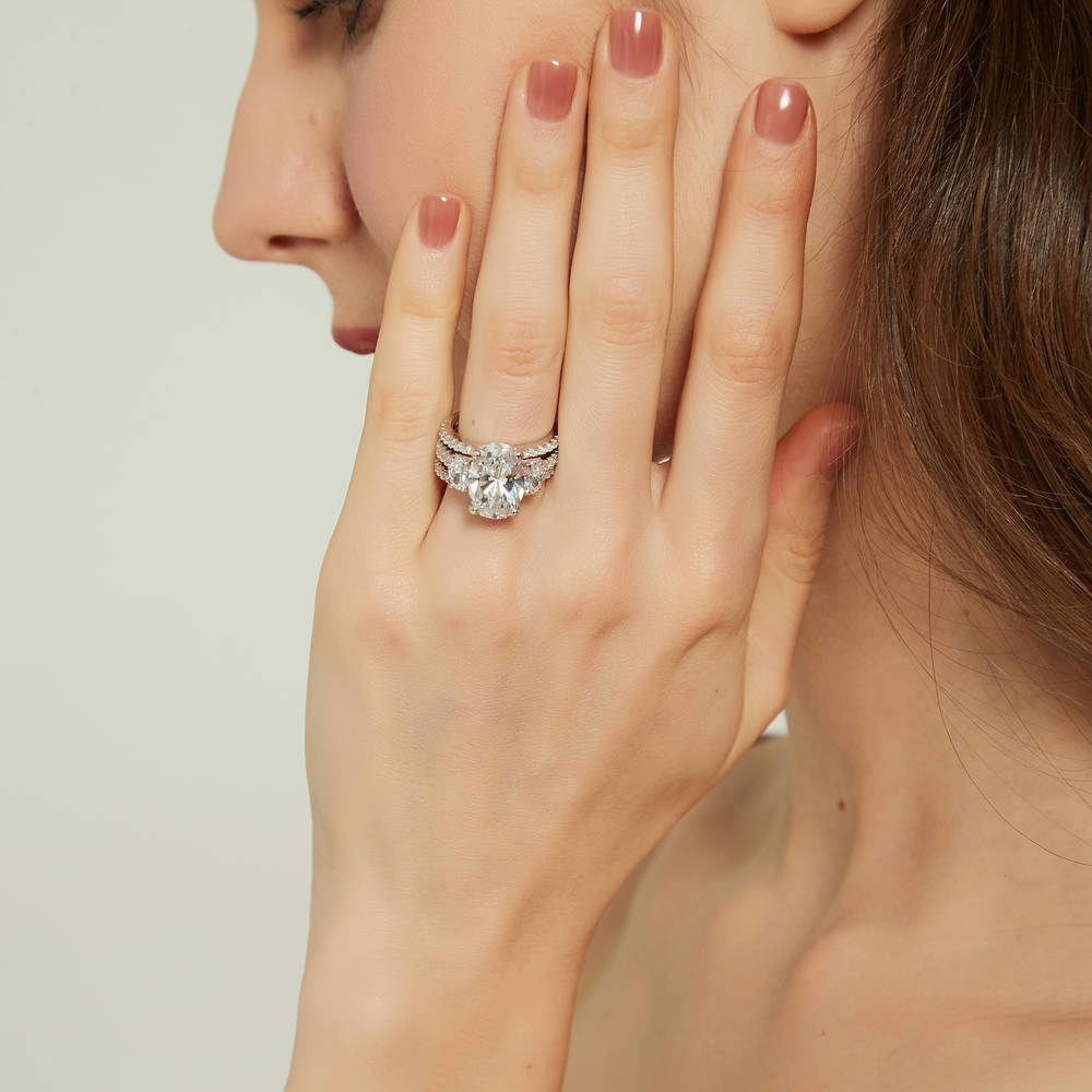 Model wearing 3-Stone Oval CZ Ring Set in Sterling Silver