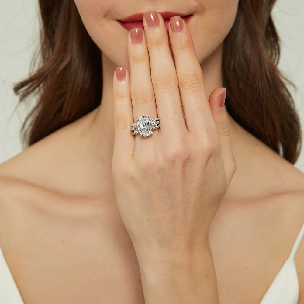 Model wearing 3-Stone Oval CZ Ring Set in Sterling Silver