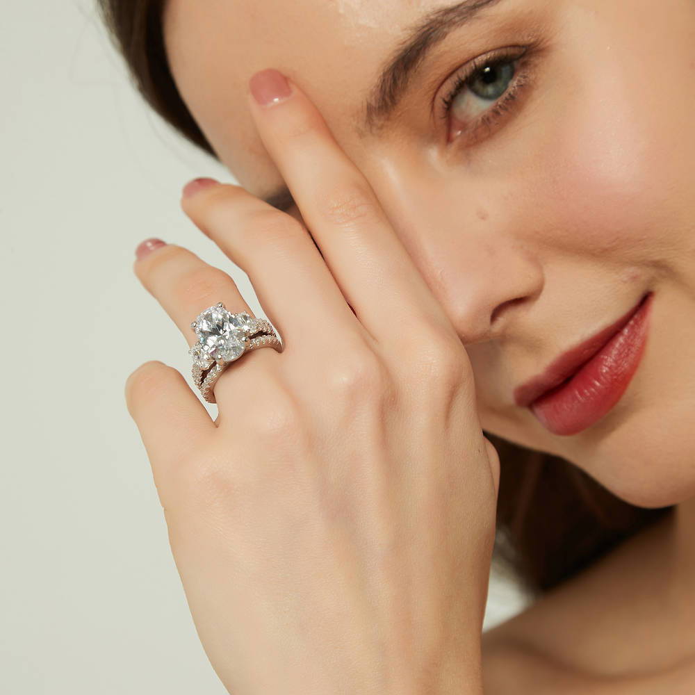 Model wearing 3-Stone Oval CZ Ring Set in Sterling Silver