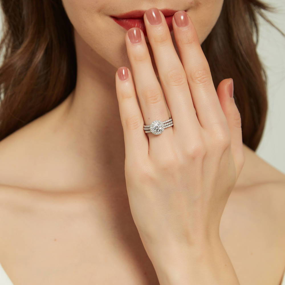 Model wearing Halo Round CZ Ring Set in Sterling Silver