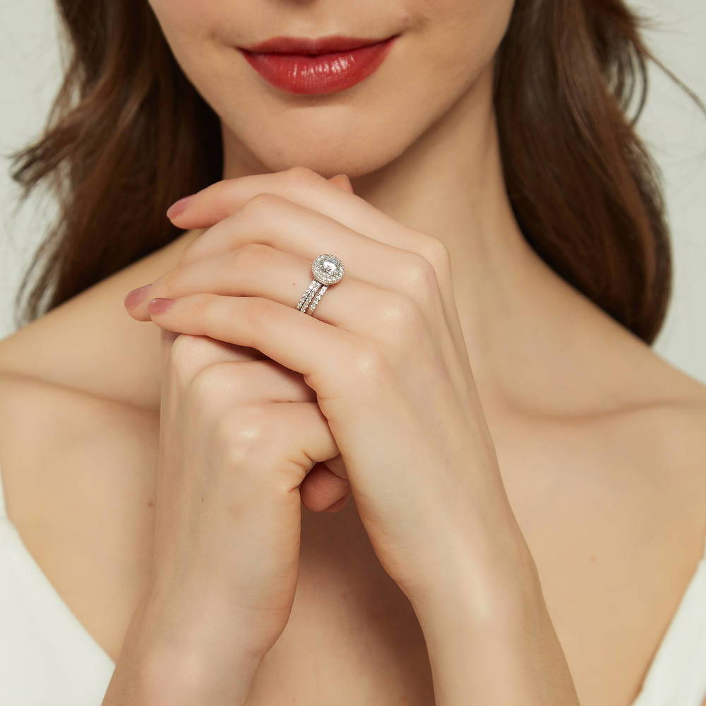 Model wearing Halo Round CZ Ring Set in Sterling Silver