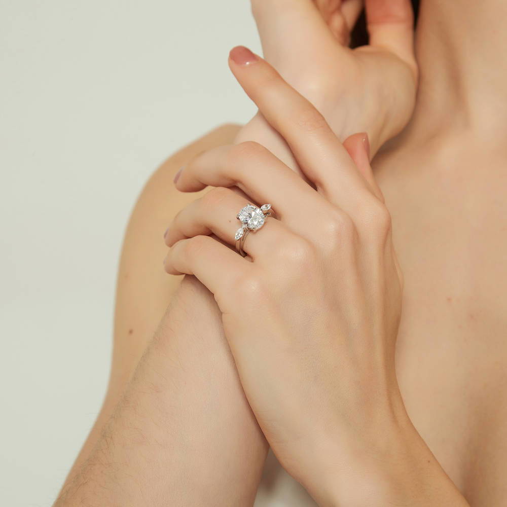 Model wearing 3-Stone Oval CZ Ring in Sterling Silver