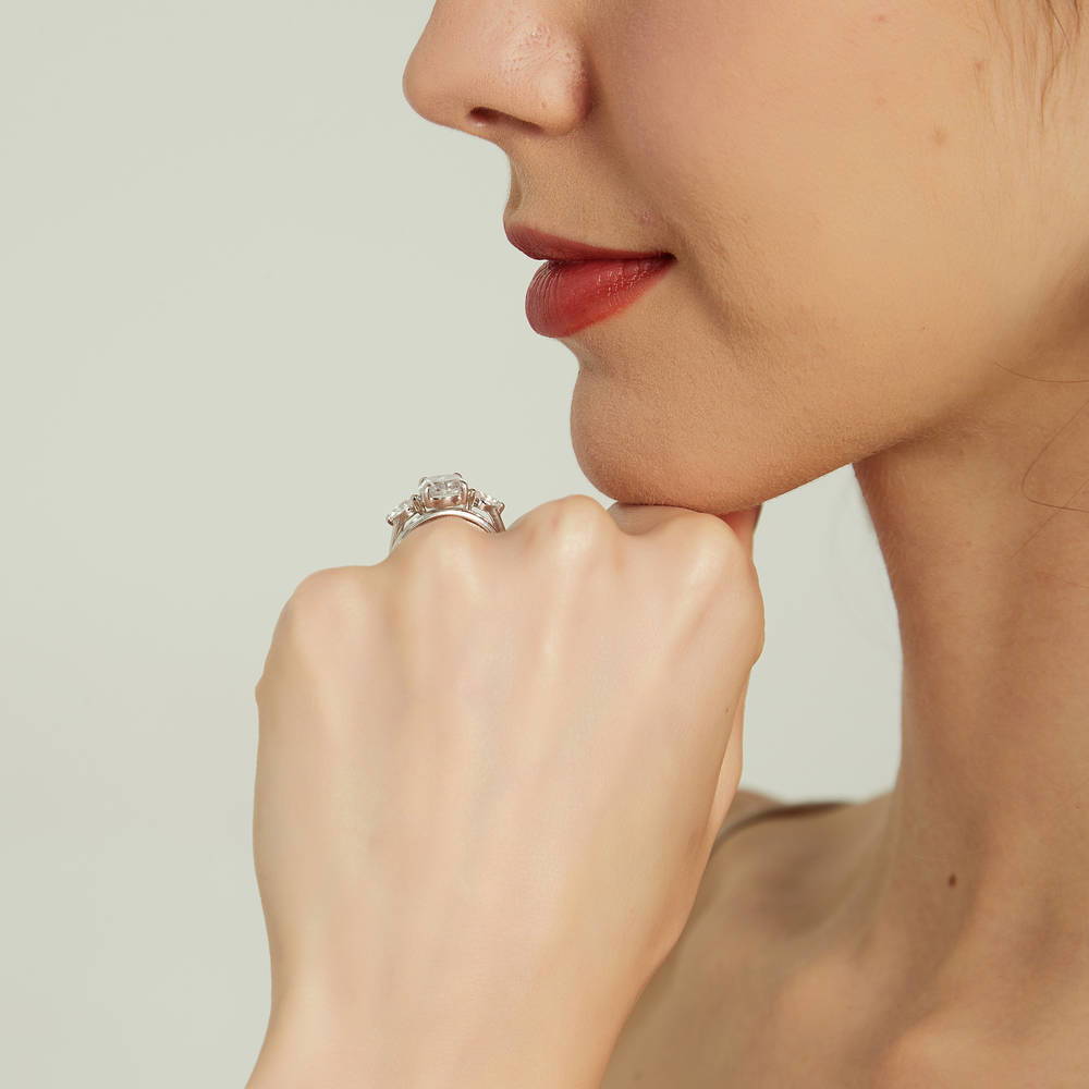 Model wearing 3-Stone Oval CZ Ring Set in Sterling Silver