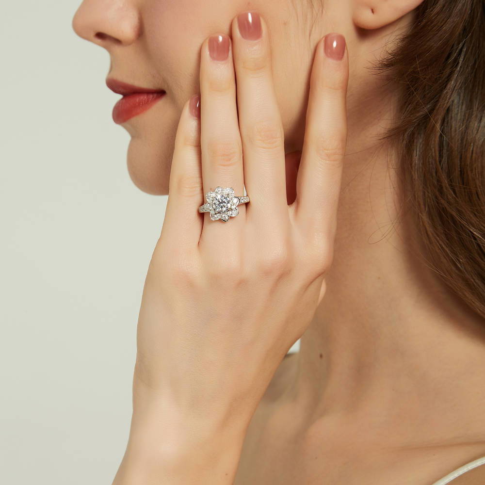 Model wearing Flower Halo CZ Ring in Sterling Silver