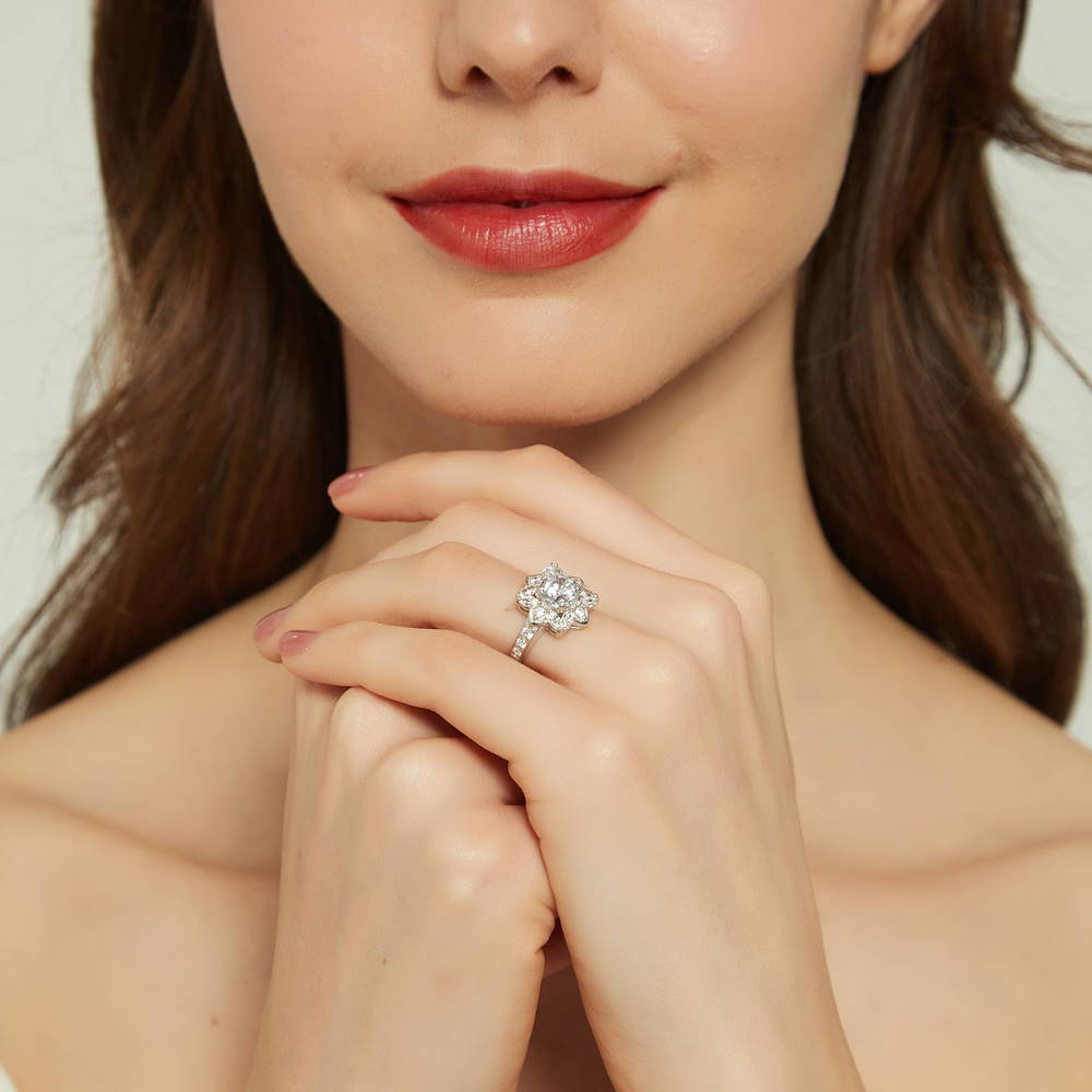 Model wearing Flower Halo CZ Ring in Sterling Silver