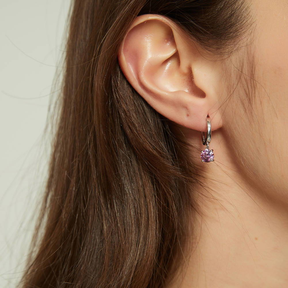 Model wearing Solitaire Round CZ Dangle Earrings in Sterling Silver 1.6ct