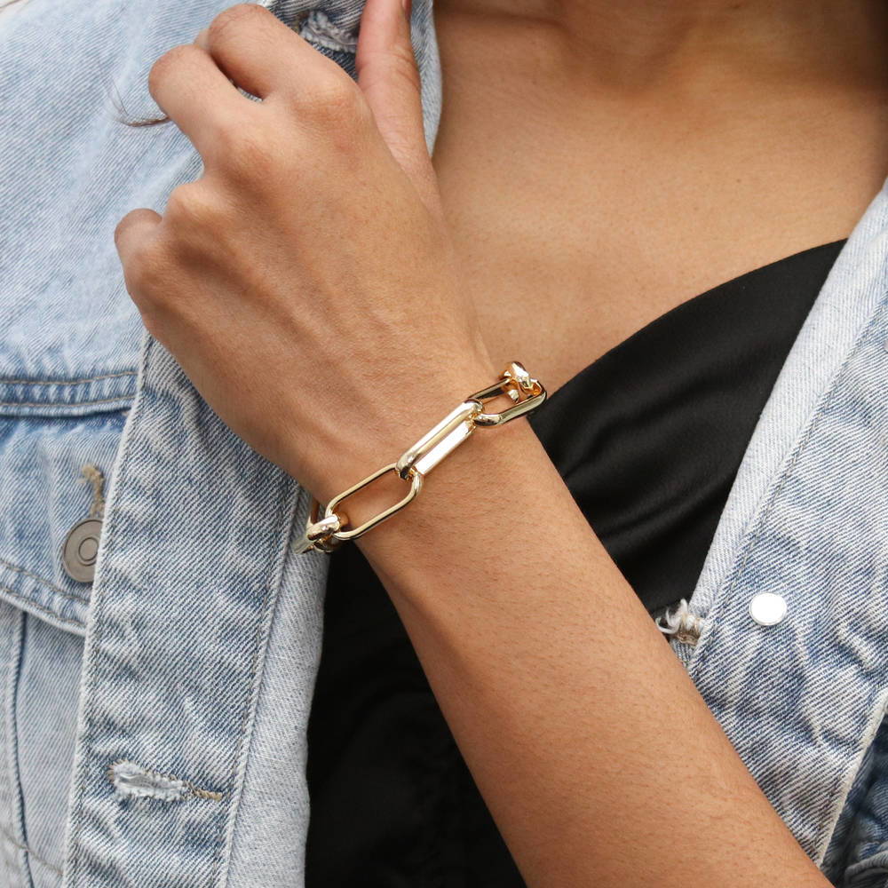 Model wearing Paperclip Statement Link Bracelet in Gold-Tone