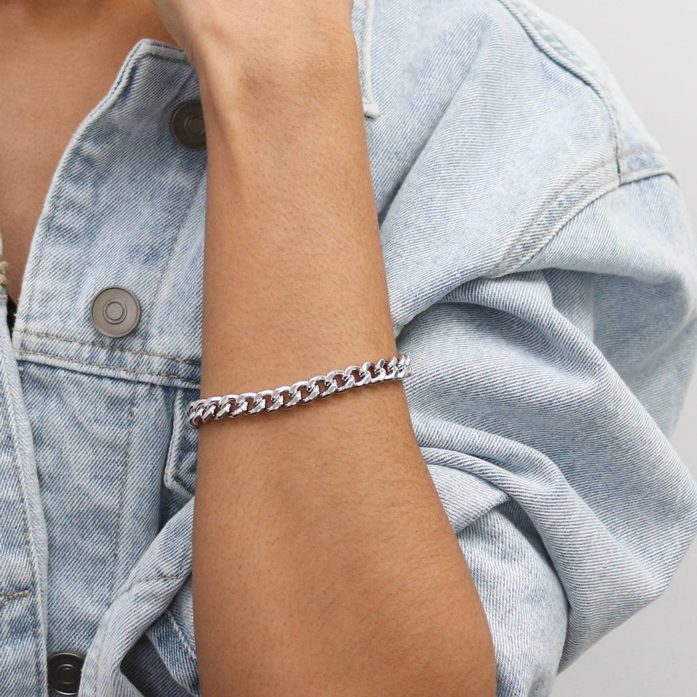 Model wearing Statement Lightweight Curb Chain Bracelet in Silver-Tone 7mm