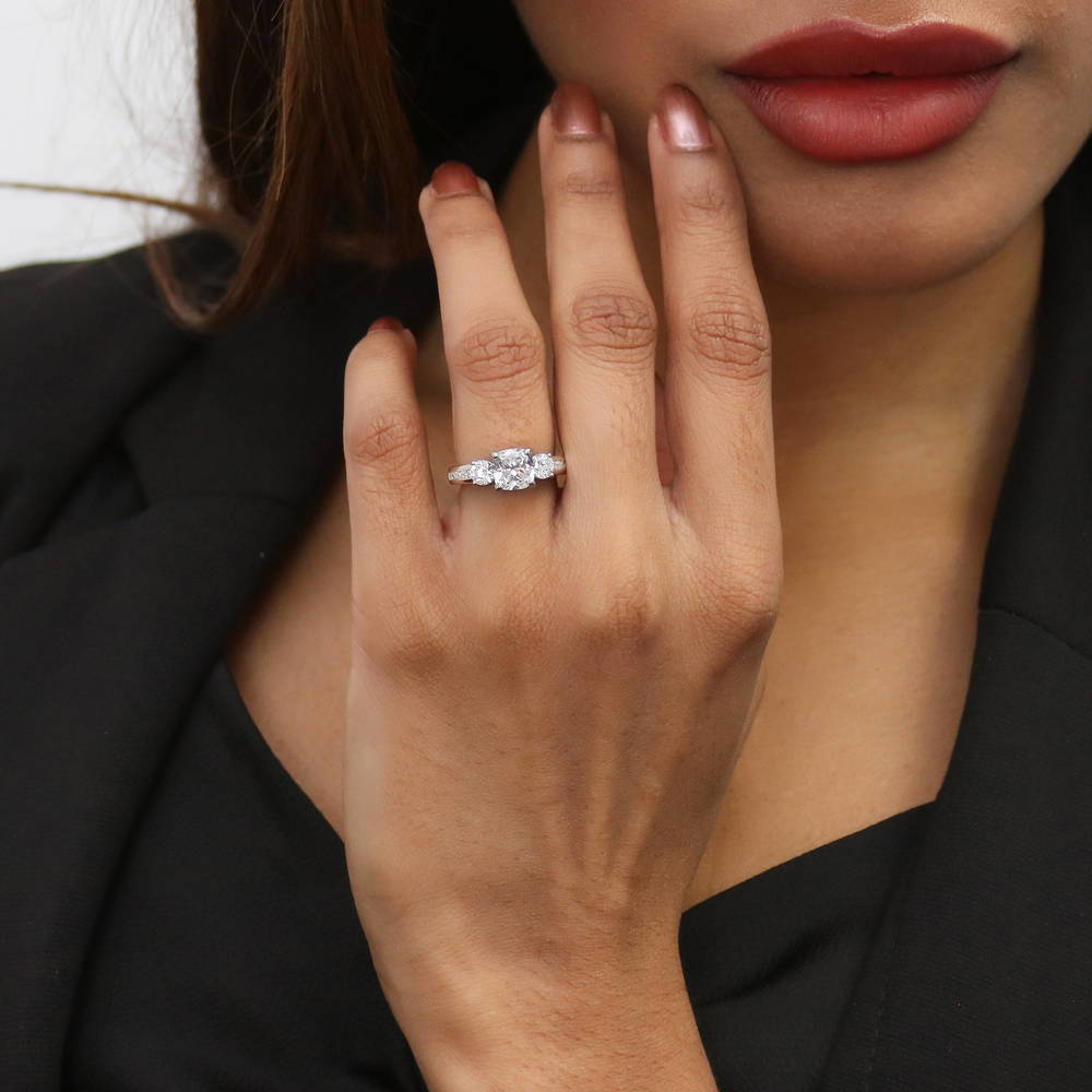 Model wearing 3-Stone Cushion CZ Ring in Sterling Silver