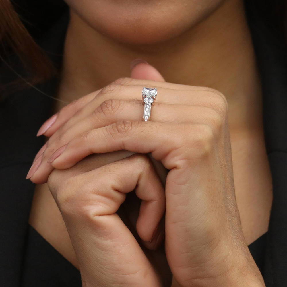 Model wearing 3-Stone Cushion CZ Ring in Sterling Silver