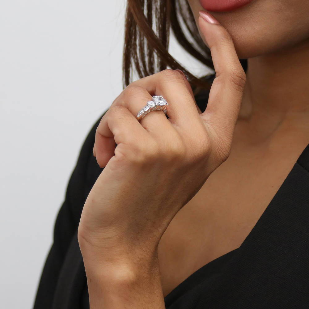 Model wearing 3-Stone Cushion CZ Ring in Sterling Silver