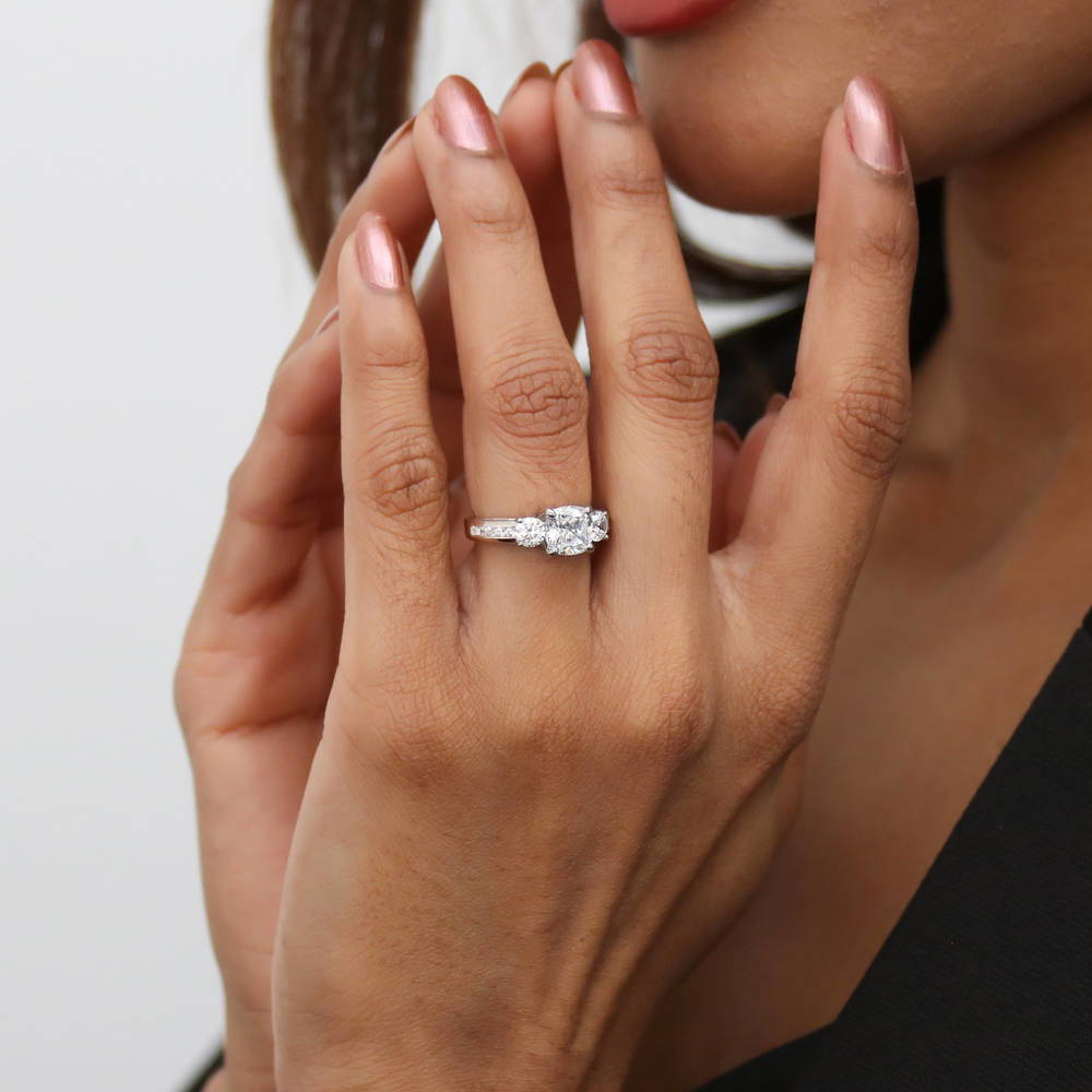 Model wearing 3-Stone Cushion CZ Ring in Sterling Silver