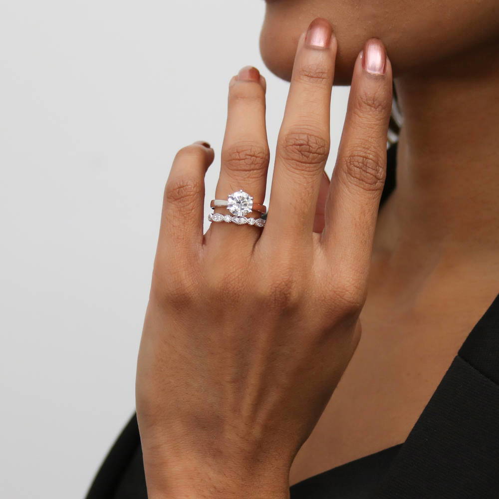 Model wearing Solitaire 2ct Round CZ Ring Set in Sterling Silver