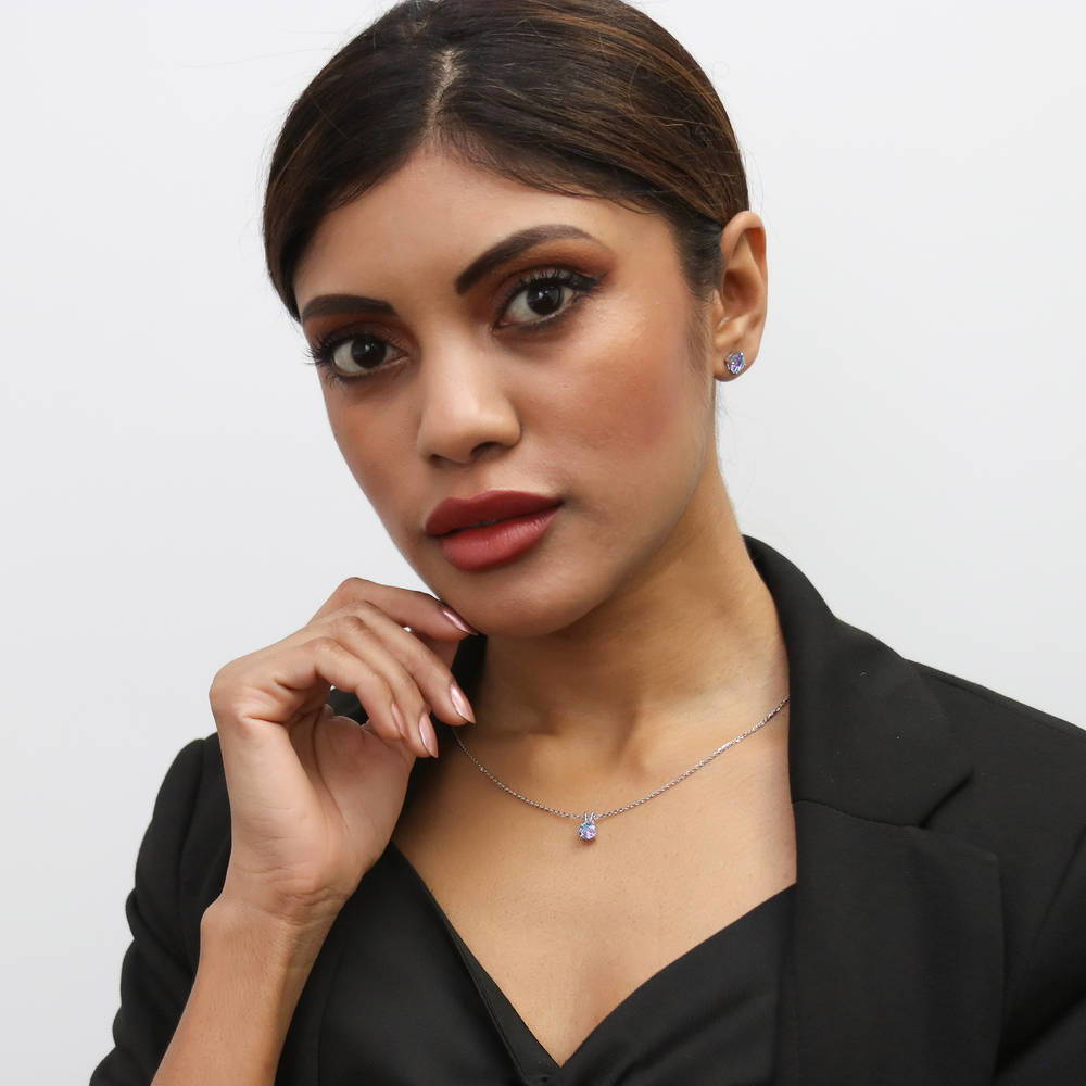Model wearing Kaleidoscope Solitaire CZ Pendant Necklace in Sterling Silver