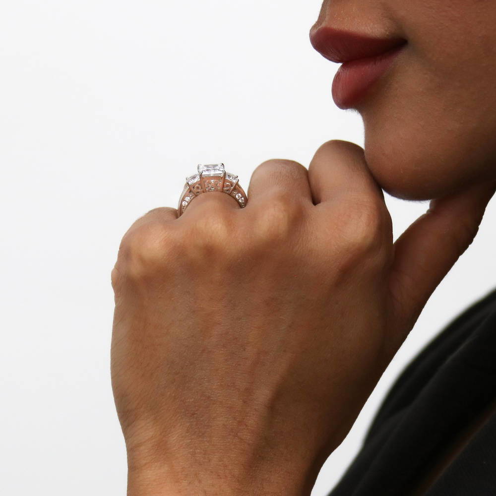 Model wearing 3-Stone Princess CZ Ring in Sterling Silver