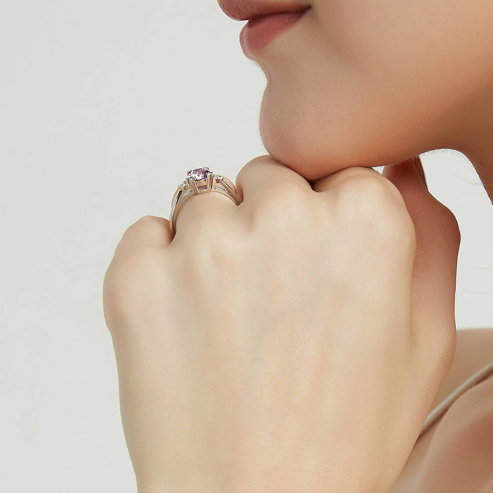 Model wearing 3-Stone Purple Round CZ Ring in Sterling Silver, 7 of 9