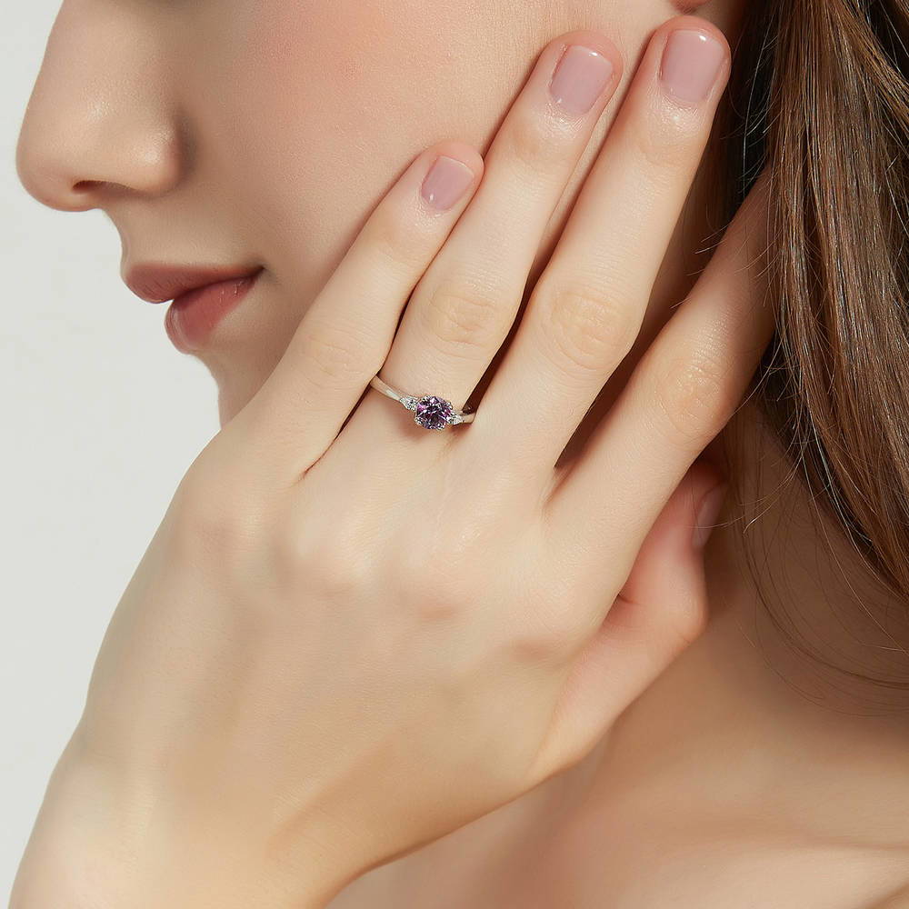 Model wearing 3-Stone Purple Round CZ Ring in Sterling Silver