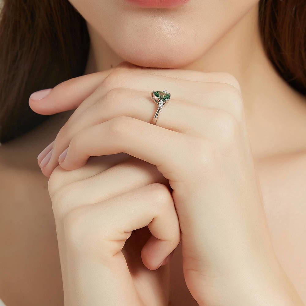 Model wearing 3-Stone Green Pear CZ Ring in Sterling Silver, 6 of 9