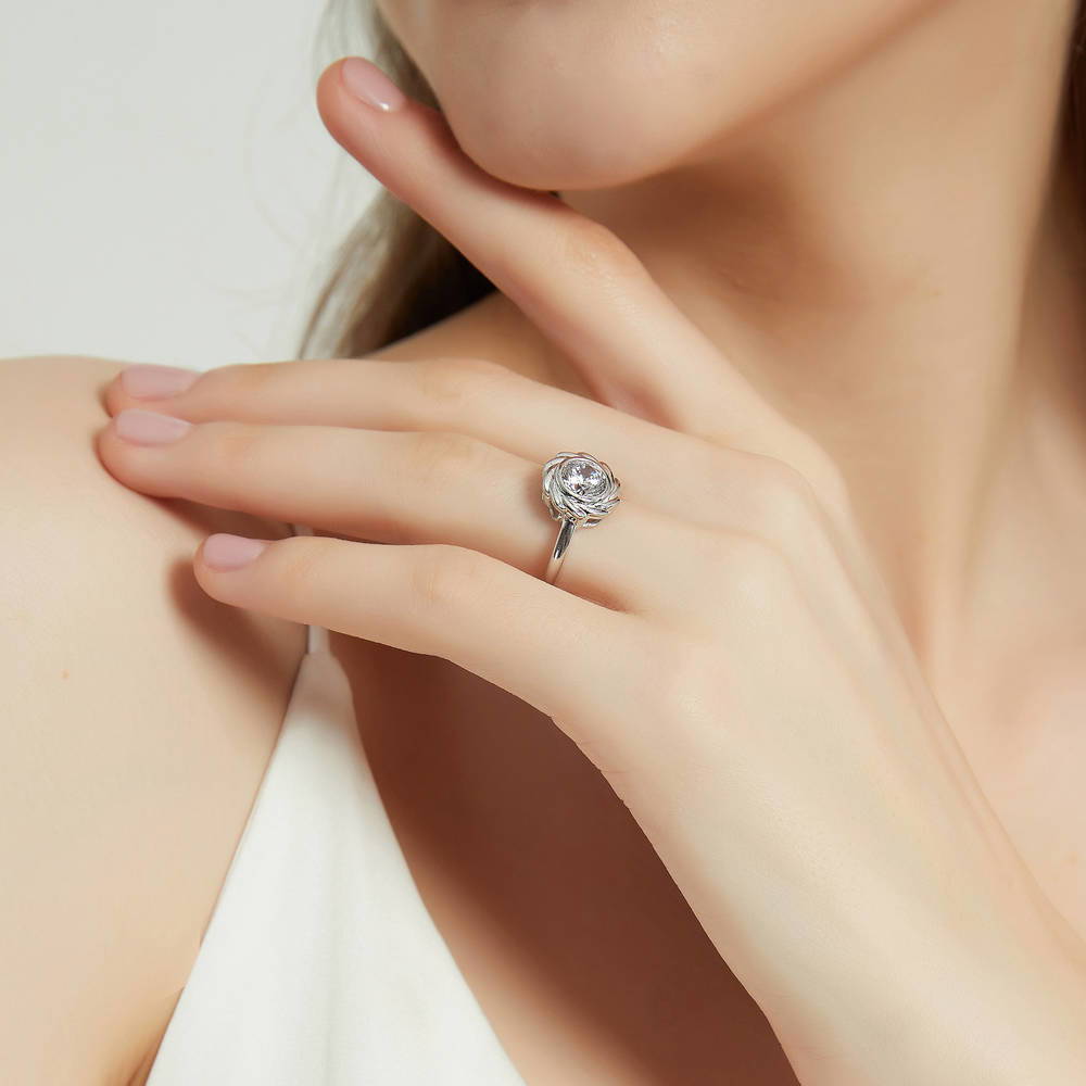 Model wearing Woven Solitaire Bezel Set CZ Ring in Sterling Silver