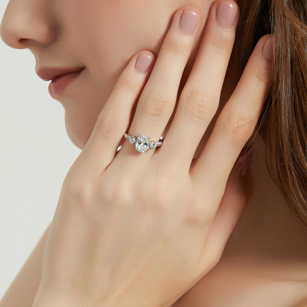 Model wearing 3-Stone Cable Oval CZ Ring in Sterling Silver