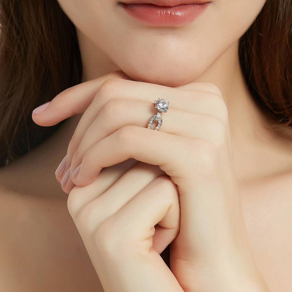 Model wearing Solitaire Interlocking 1.25ct Round CZ Ring in Sterling Silver, 6 of 9