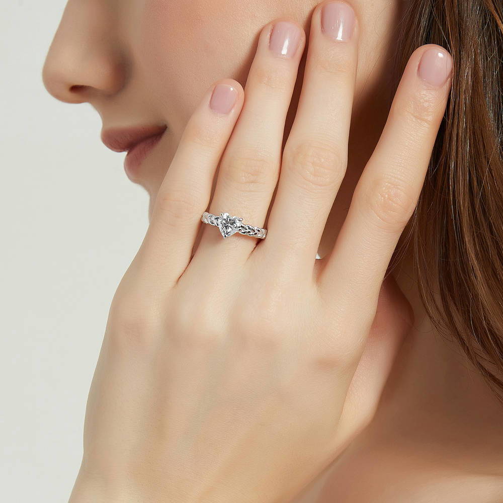 Model wearing Woven Solitaire CZ Ring in Sterling Silver