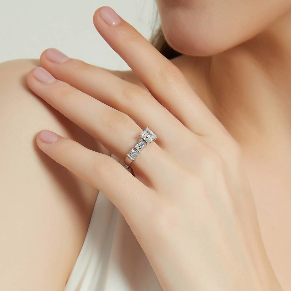 Model wearing Solitaire 1.2ct Princess CZ Ring in Sterling Silver