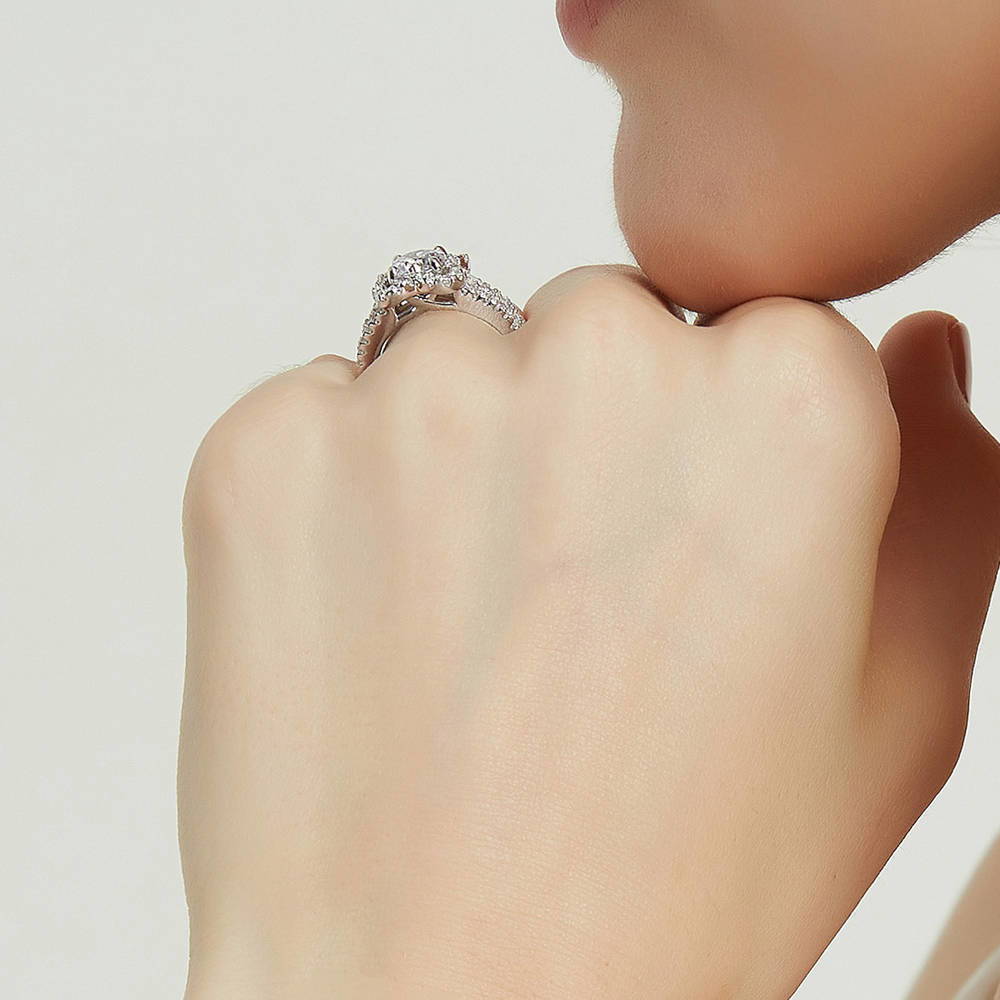 Model wearing Flower CZ Ring in Sterling Silver