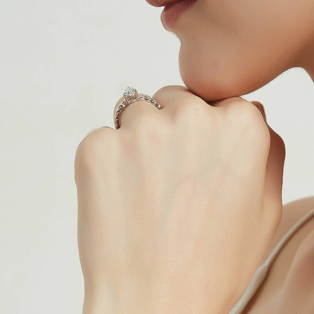 Model wearing Woven Solitaire CZ Ring in Sterling Silver